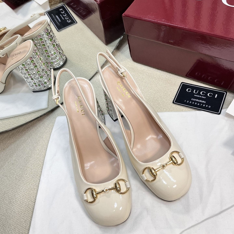 G*u*i sandals